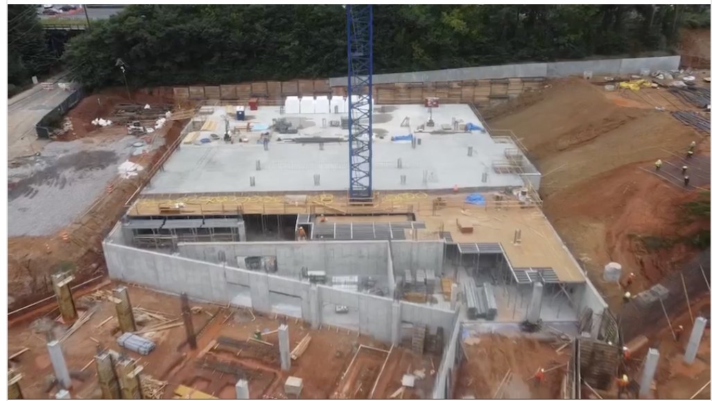 Aerial view of retaining walls and an elevated deck prepared for a concrete pour